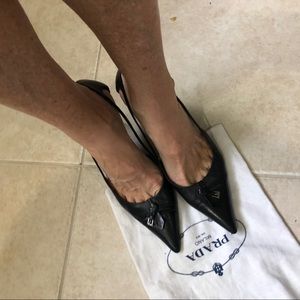 Prada black leather pumps